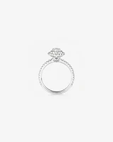 Oval Halo Ring with 0.90 Carat TW of Diamonds in 18kt White Gold