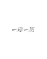 0,25 Carat TW Boucles d'oreilles puces solitaires en diamant en or blanc 18kt