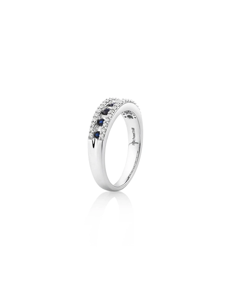 Bague en or blanc 10 K avec saphirs et diamants totalisant 0,29 ct