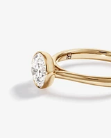 1.25 Carat TW Round Brilliant Laboratory-Grown Diamond Solitaire Bezel Set Engagement Ring in 14kt Yellow Gold