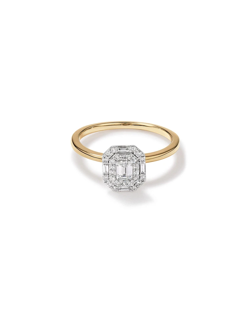 0.51 Carat TW Emerald Cut Diamond Baguette and Round Brilliant Halo Engagement Ring in 14kt Yellow and White Gold