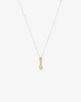 0.17 Carat TW Diamond Knot Pendant in 10kt Yellow Gold