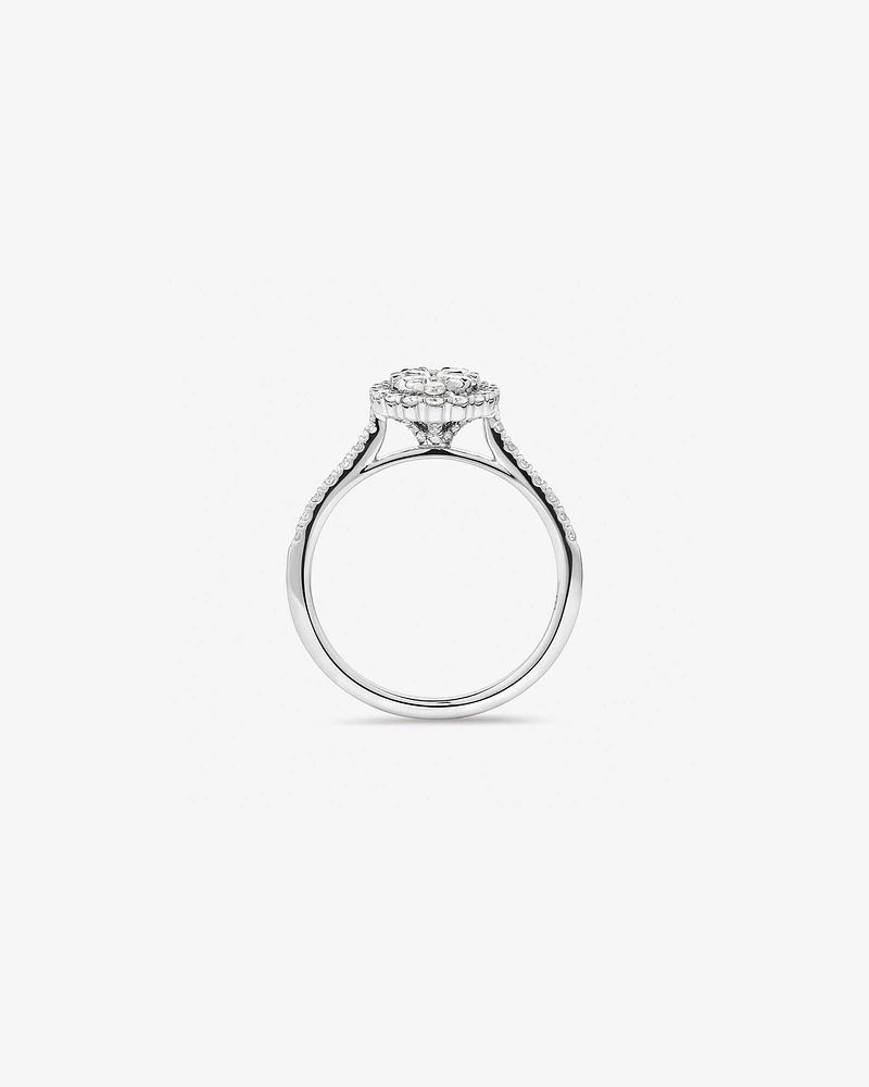 0.86 Carat TW Oval Shaped Cluster Diamond Halo Engagement Ring in 14kt White Gold