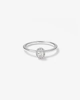 0.31 Carat TW Oval Cut Diamond Halo Engagement Ring in 14kt White Gold