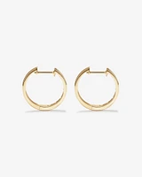 0.25 Carat TW Channel Set Round Brilliant Diamond Huggie Hoop Earrings in 10kt Yellow Gold