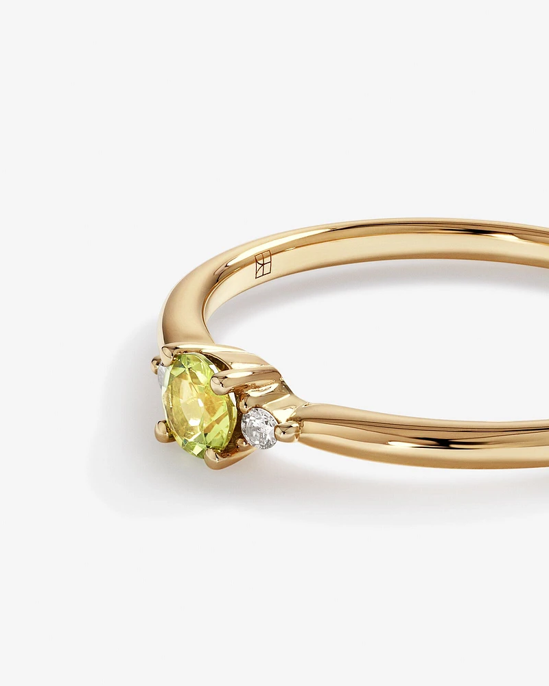 3 Stone Ring with Peridot & Diamonds in 10kt Yellow Gold