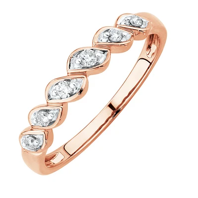 Fancy Twist Ring with 0.10 Carat TW of Diamonds in 10kt Yellow Gold