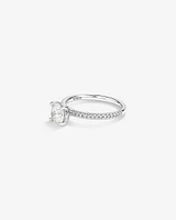 1.14 Carat TW of Diamonds Engagement Ring with a 1 Carat Round Centre Laboratory-Grown Diamond and shouldered by 0.14 Carat TW of Natural Diamonds in 14kt White Gold