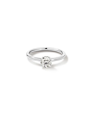 0.68 Carat TW Round Brilliant Diamond Solitaire Hidden Pave Halo Engagement Ring in Platinum