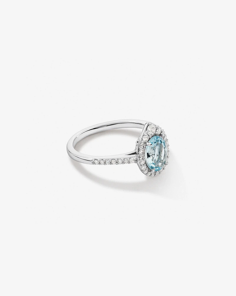 Halo Ring with Aquamarine & 0.29 Carat TW of Diamonds in 10kt White Gold