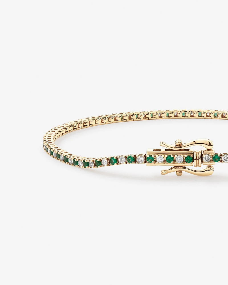 0.68 Carat TW Diamond and Created Emerald Tennis Bracelet in 10kt Yellow Gold