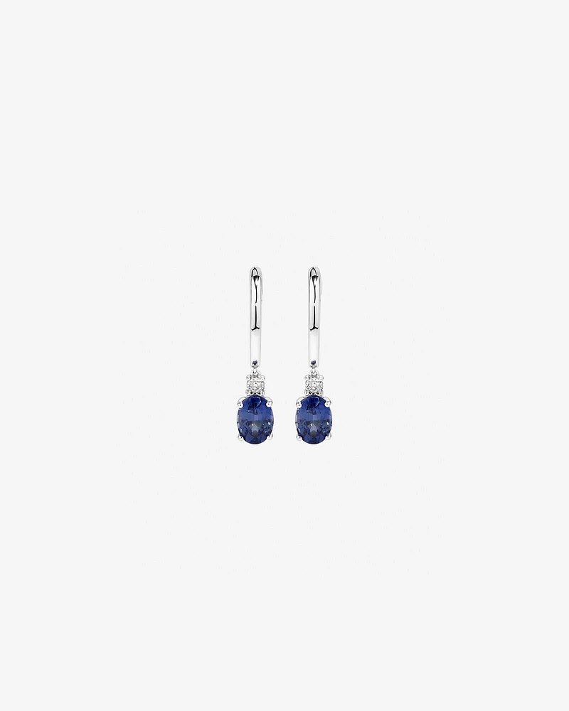 Oval Cut Blue Created Ceylon Sapphire Gemstone and Diamond Drop Huggie Earrings in Sterling Silver