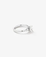 1.10 Carat TW Three Stone Oval and Pear Hidden Halo Engagement Ring in Platinum