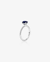 Solitaire Sapphire Ring with 0.25 Carat TW of Diamonds in 10kt White Gold