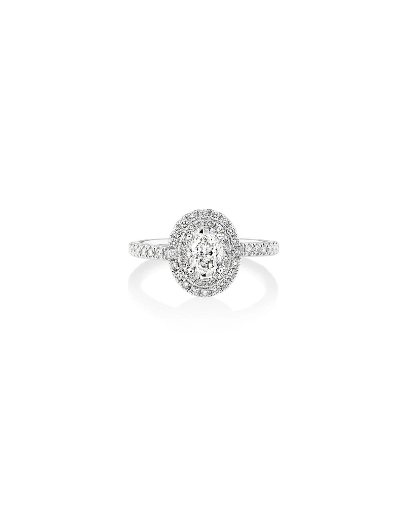 Bague à halo ovale en or blanc 18 K avec diamants totalisant 0,90 ct