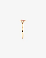 Pear Cut Red Ruby Gemstone and 0.08 Carat TW Diamond Halo Ring in 10kt Yellow Gold