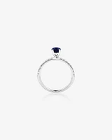 Solitaire Sapphire Ring with 0.25 Carat TW of Diamonds in 10kt White Gold