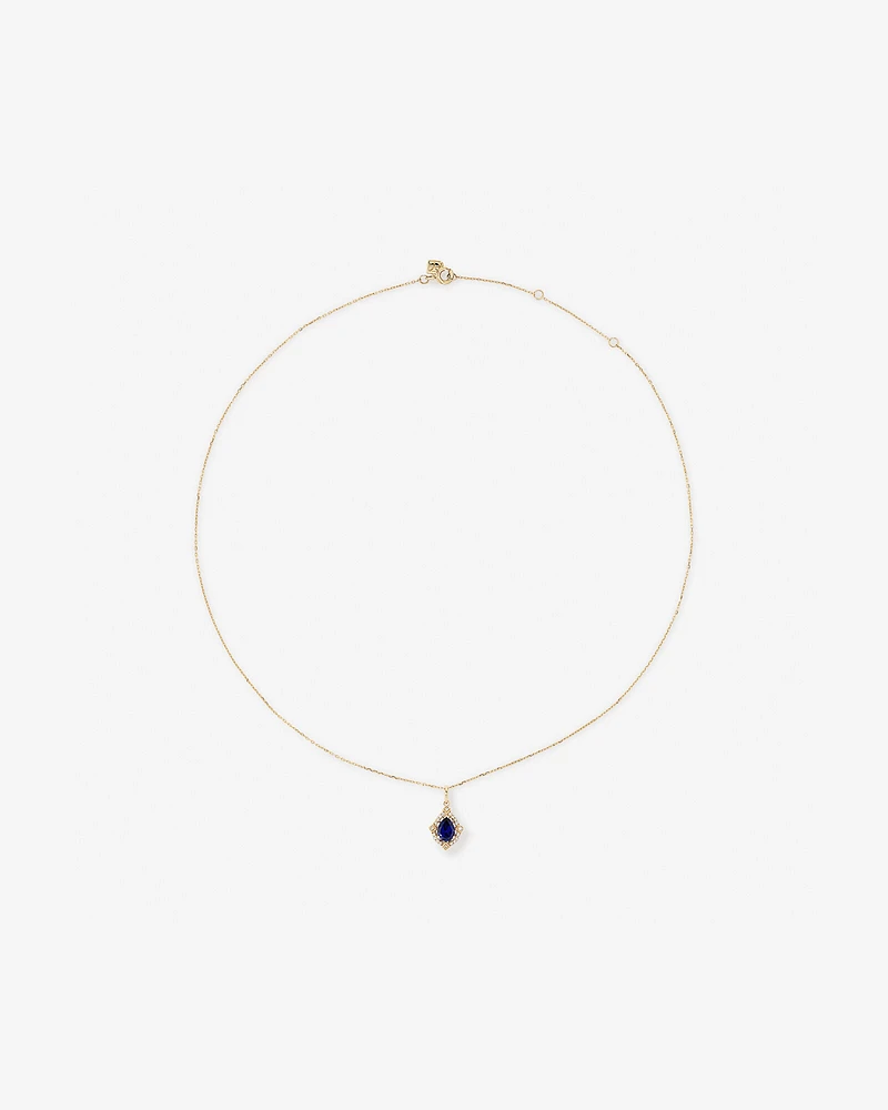 Pear Cut Created Sapphire and Diamond Halo Pendant Necklace in 10kt Yellow Gold