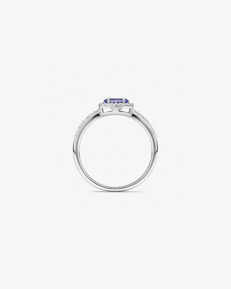 Halo Ring with Tanzanite & 0.15 Carat TW Of Diamonds in 10kt White Gold