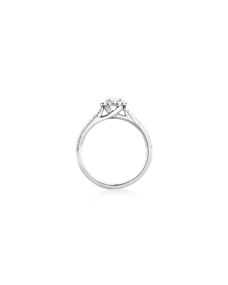 Halo Oval Engagement Ring with 0.92 Carat TW of Diamonds in 14kt White Gold