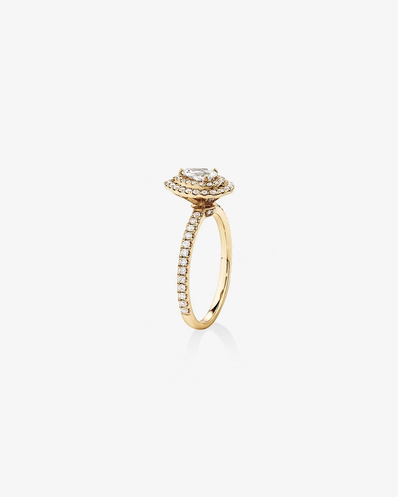 Double Halo Ring with 0.71 Carat TW of Diamonds in 18kt Gold