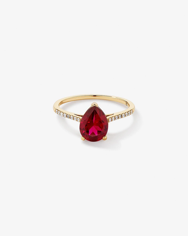 Pear Cut Red Created Ruby Gemstone and Diamond Ring in 10kt Yellow Gold