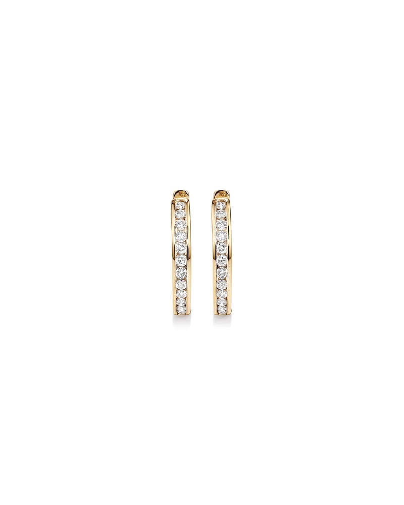 0.25 Carat TW Channel Set Round Brilliant Diamond Huggie Hoop Earrings in 10kt Yellow Gold