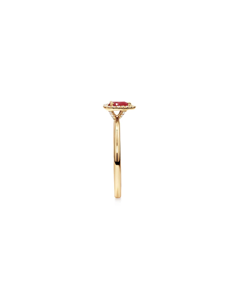 Pear Cut Red Ruby Gemstone and 0.08 Carat TW Diamond Halo Ring in 10kt Yellow Gold