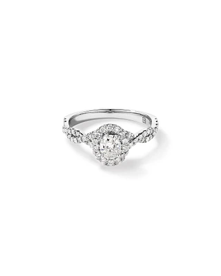 0.75 Carat TW Oval Cut Diamond Twist Side Accent Halo Engagement Ring in 14kt White Gold