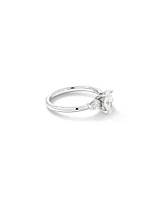 1.10 Carat TW Three Stone Oval and Pear Hidden Halo Engagement Ring in Platinum