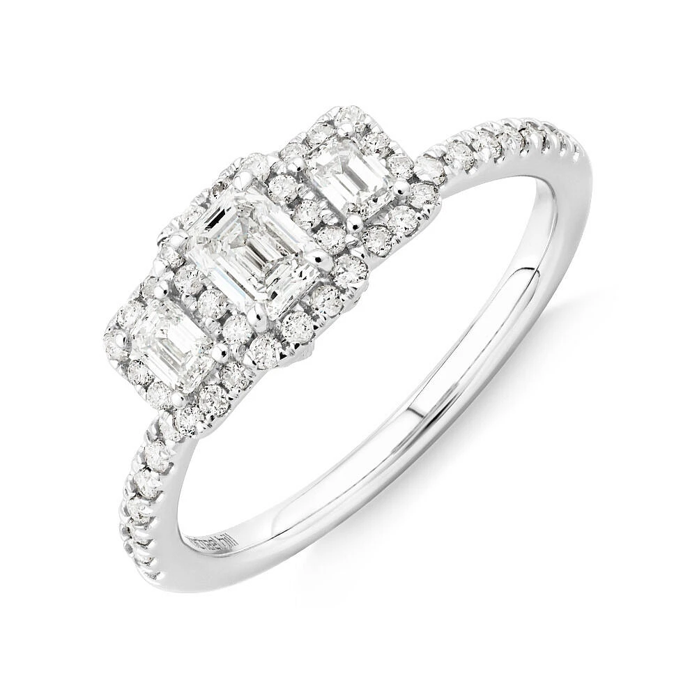 0.80 Carat TW Three Stone Emerald Cut Halo Engagement Ring in 14kt White Gold