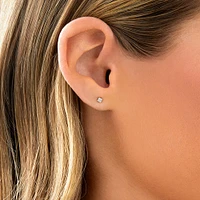 Boutons d'oreilles à solitaire en or jaune 10 K avec diamants totalisant 0,10 ct