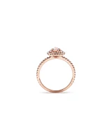 Pear Cut Morganite Gemstone and 0.45 Carat TW Diamond Halo and Side Accent Engagement Ring in 10kt Rose Gold