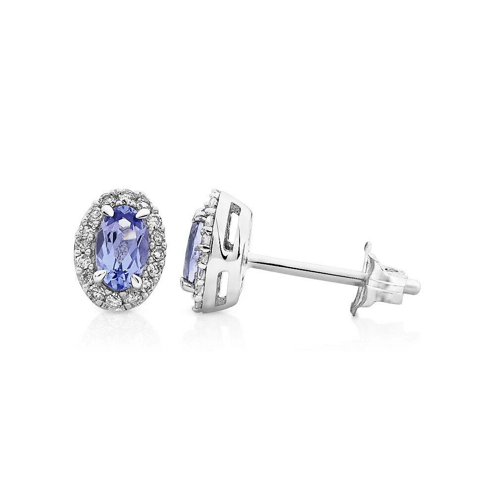 Halo Stud Earrings with Tanzanite & 0.12 Carat TW Of Diamonds in 10kt White Gold