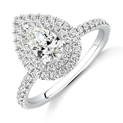 Halo Ring with 0.90 Carat TW of Diamonds in 18kt White Gold