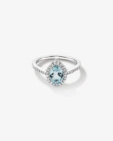 Halo Ring with Aquamarine & 0.29 Carat TW of Diamonds in 10kt White Gold