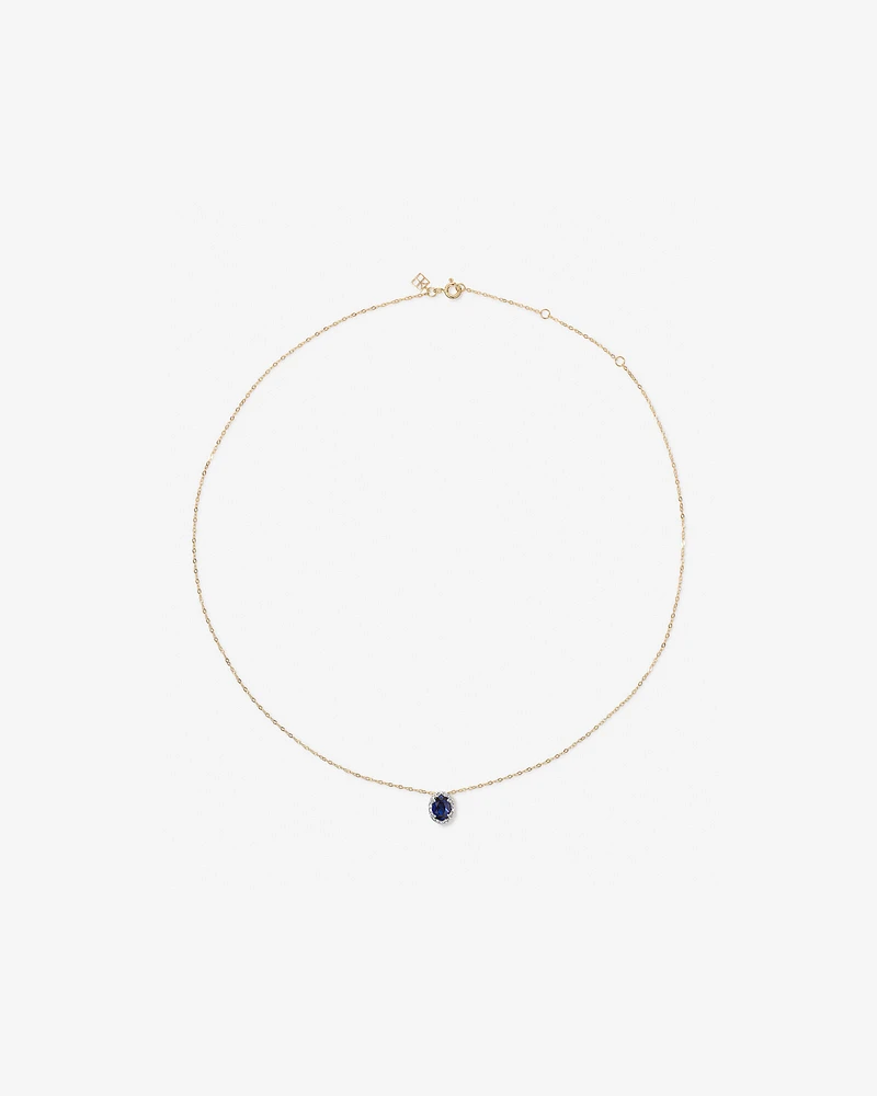 Oval Cut Blue Created Sapphire and Lab-Grown Diamond Halo Stud Earrings and Pendant Necklace Set in 10kt Yellow Gold and Rhodium