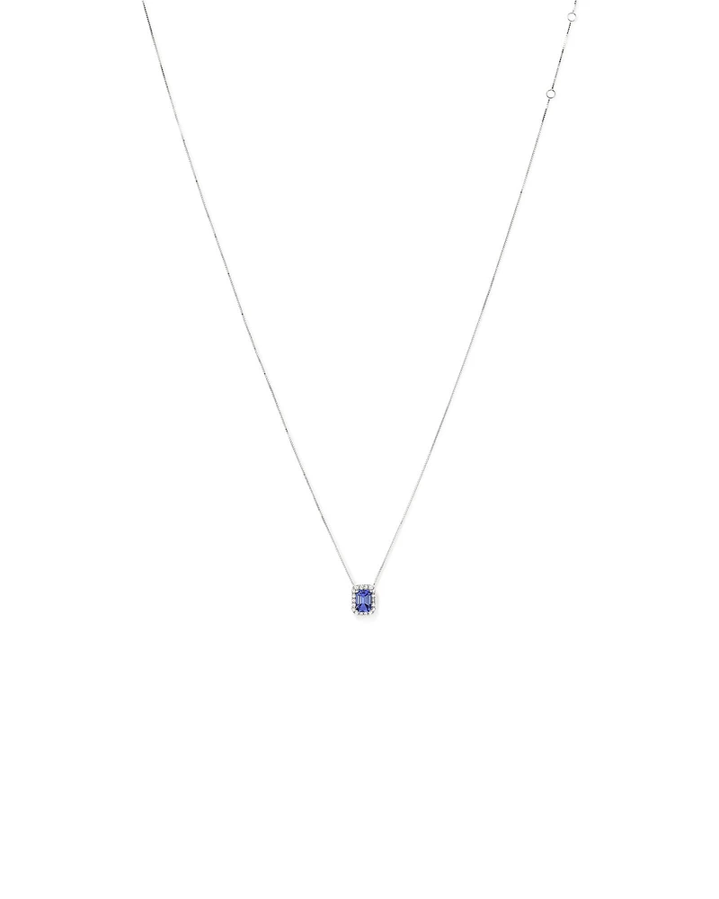 Emerald Cut Blue Tanzanite and 0.17 Carat TW Diamond Halo Pendant in 14kt White Gold