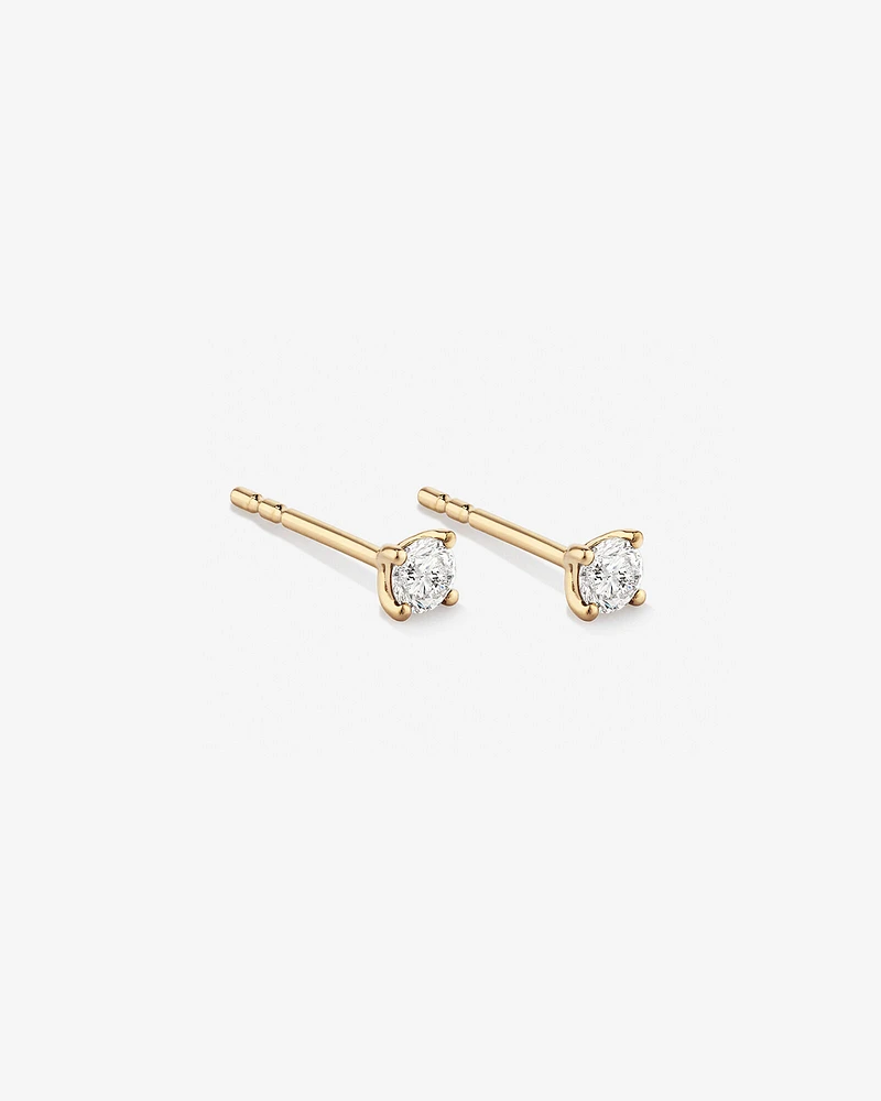 0,25 Carat TW Boucles d'oreilles puces solitaires en or blanc 18kt