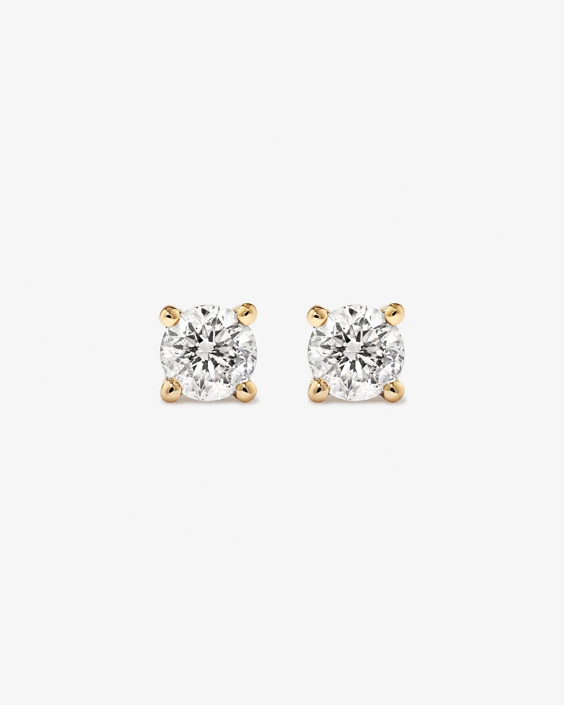 0,25 Carat TW Boucles d'oreilles puces solitaires en or blanc 18kt