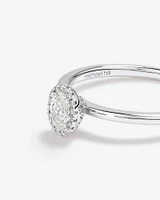 0.31 Carat TW Oval Cut Diamond Halo Engagement Ring in 14kt White Gold