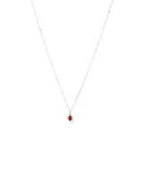 Oval Cut Created Ruby and Diamond Halo Pendant Necklace in 10kt Yellow Gold