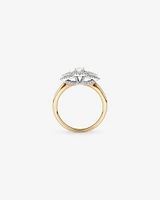 0.69 Carat TW Three Stone Oval and Pear Cut Diamond Halo Engagement Ring in 14kt Yellow and White Gold