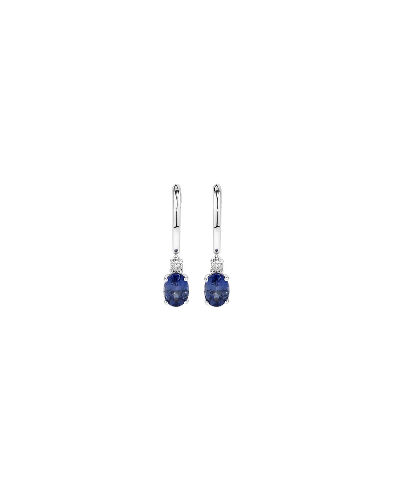 Oval Cut Blue Created Ceylon Sapphire Gemstone and Diamond Drop Huggie Earrings in Sterling Silver