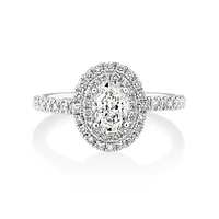 Oval Halo Ring with 0.90 Carat TW of Diamonds in 18kt White Gold