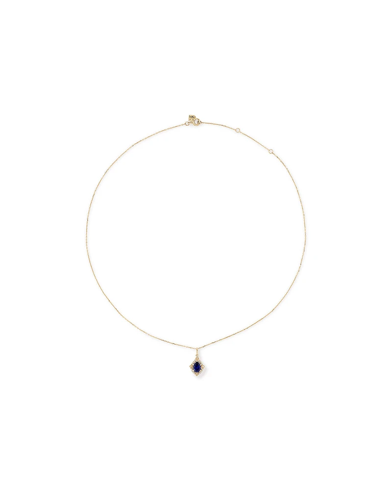 Pear Cut Created Sapphire and Diamond Halo Pendant Necklace in 10kt Yellow Gold