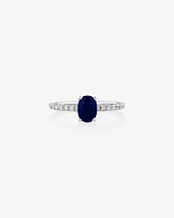 Solitaire Sapphire Ring with 0.25 Carat TW of Diamonds in 10kt White Gold