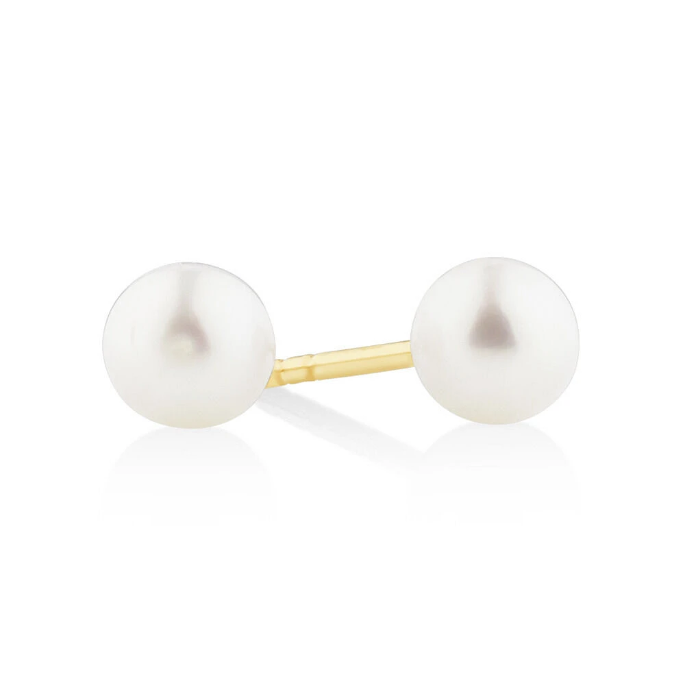 Stud Earrings with 4mm Round Cultured Freshwater Pearl in 10kt Yellow Gold