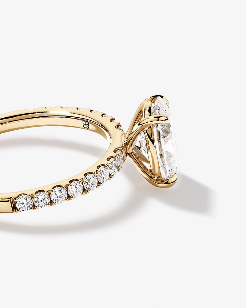 1.81 Carat TW Oval Lab-Grown Diamond Side Accent Engagement Ring in 14kt Yellow Gold
