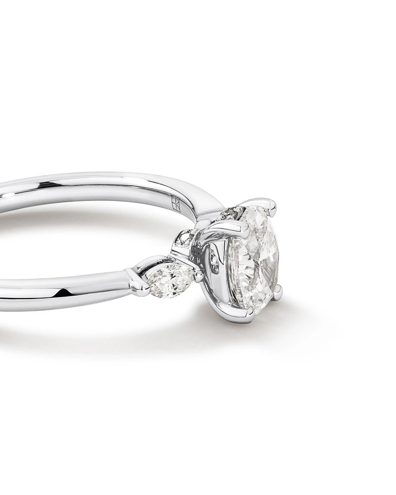 0.77 Carat TW Three Stone Oval and Marquise Cut Hidden Halo Engagement Ring in Platinum